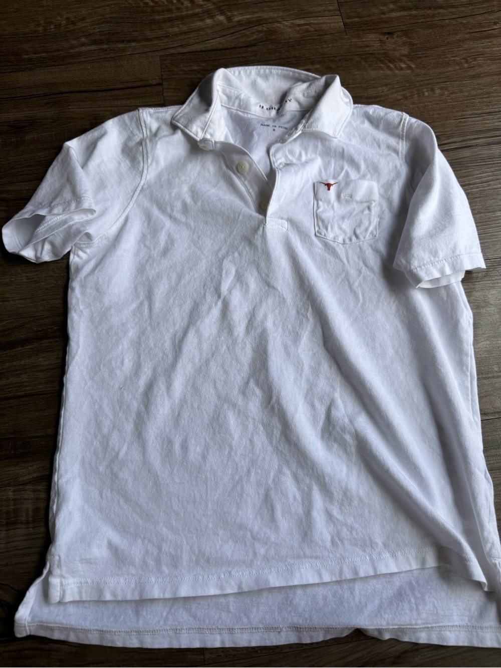 B. Draddywhit polo shirt size 8